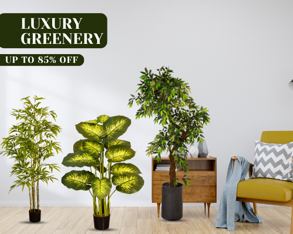 Arick Decor Luxury Greenery sale banner featuring bamboo, broad-leaf, and tree-style artificial plants styled in a modern living room with up to 85% off.
