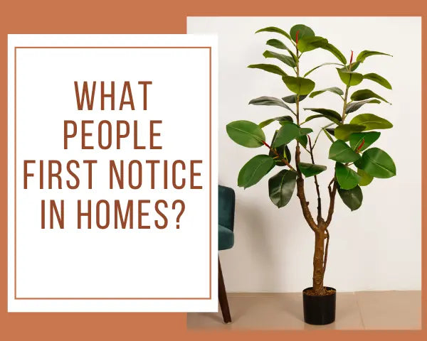 Arick Decor artificial rubber plant with glossy green leaves, styled beside a teal chair, on a terracotta banner titled "What People First Notice in Homes?"