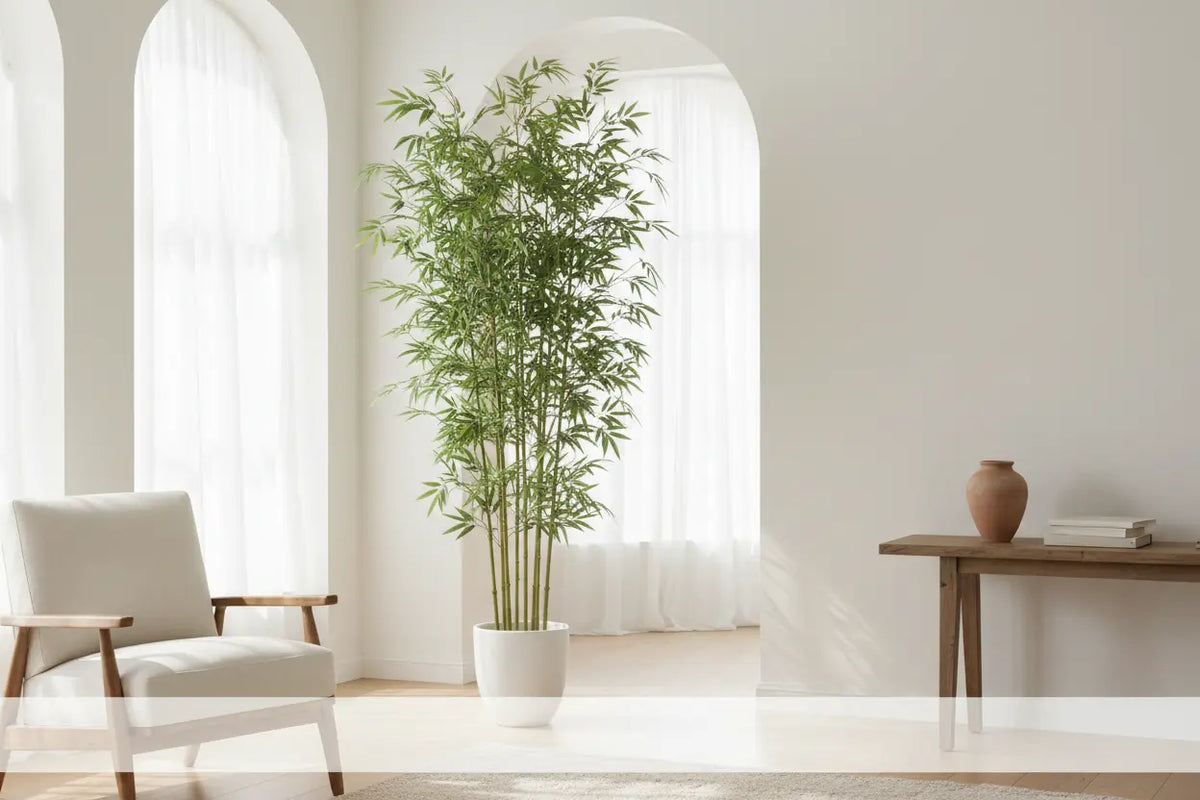 ARICK DECOR artificial bamboo tree styled in an empty corner of a modern living room
