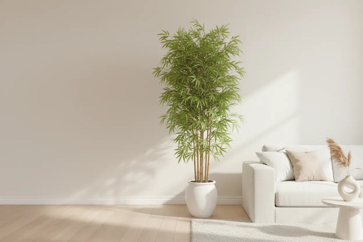 ARICK DECOR artificial bamboo tree styled with a decorative planter in a modern interior